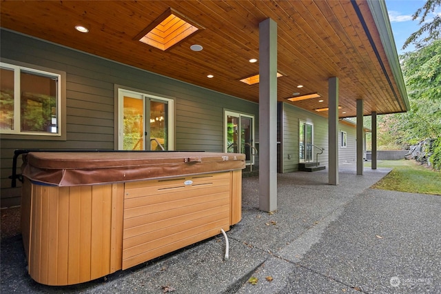 view of patio / terrace featuring a hot tub