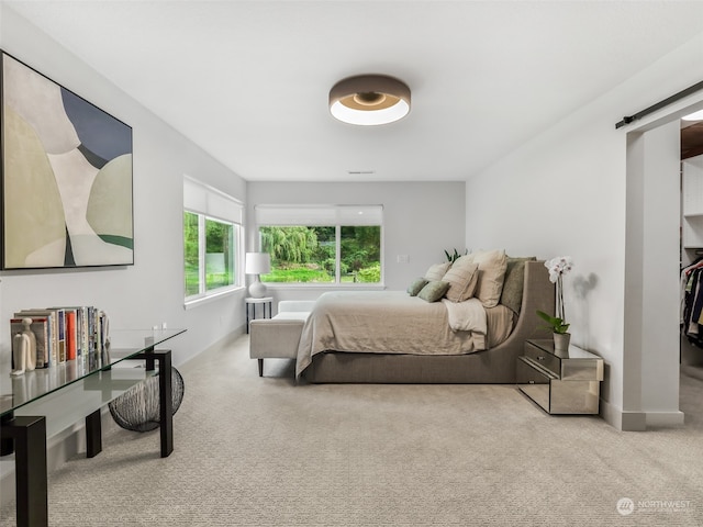 bedroom with light carpet