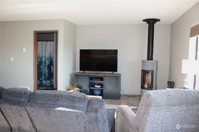 living room with a wood stove