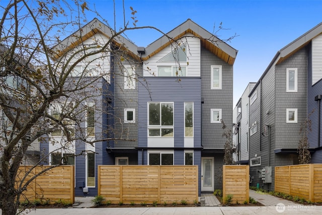 view of front of property with fence