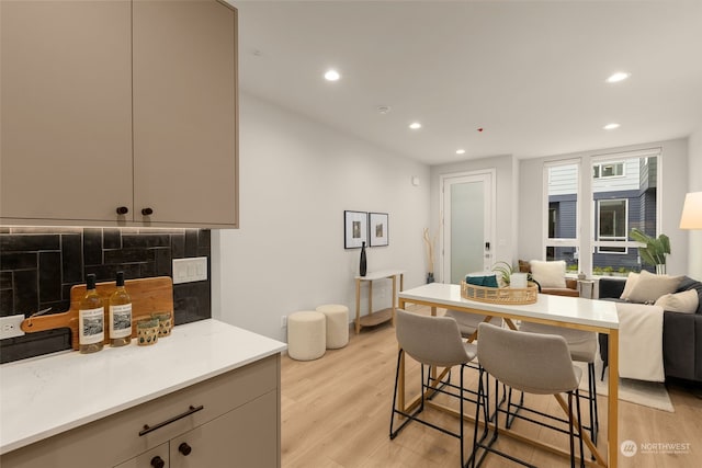 dining space with light wood-type flooring