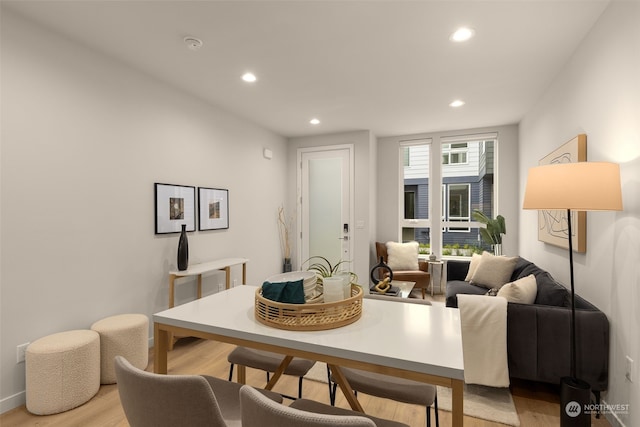 dining space featuring light hardwood / wood-style flooring