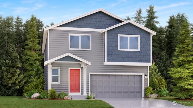 view of front of property with a front lawn and a garage