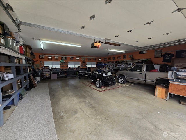 garage featuring a garage door opener