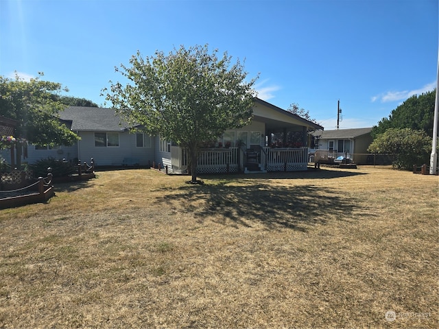 view of yard with a wooden deck