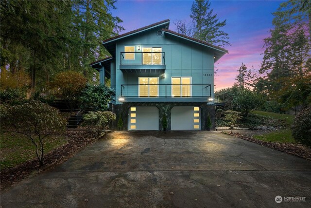 view of front of property with a garage