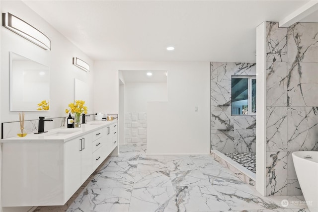 bathroom featuring vanity and separate shower and tub