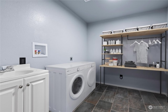 washroom with cabinets, electric dryer hookup, and sink