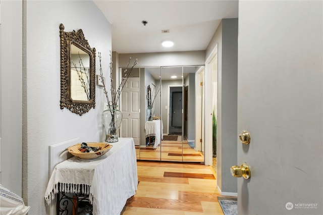 hallway featuring light wood-type flooring