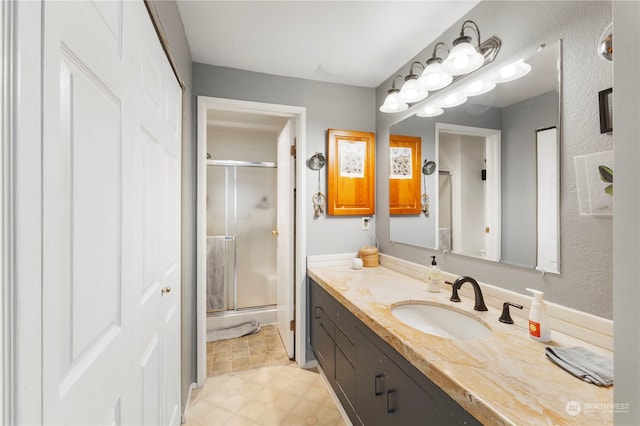 bathroom featuring vanity and tile patterned floors