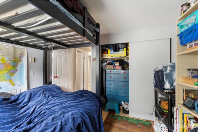 bedroom featuring hardwood / wood-style flooring