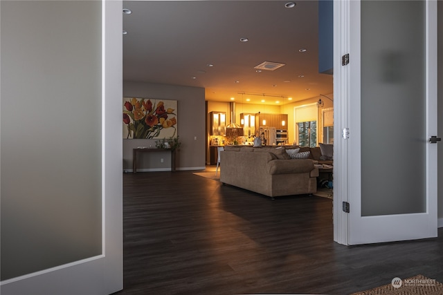 interior space with dark hardwood / wood-style flooring