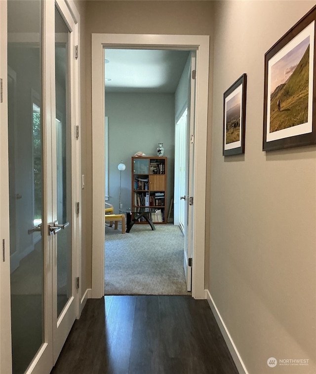 corridor with dark wood-type flooring