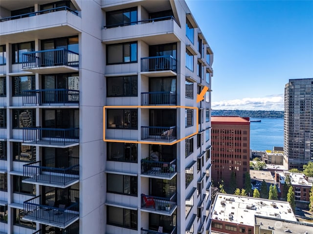 view of building exterior featuring a water view