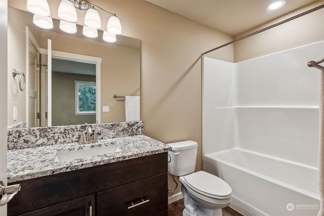 full bathroom with vanity, shower / bathing tub combination, hardwood / wood-style flooring, and toilet