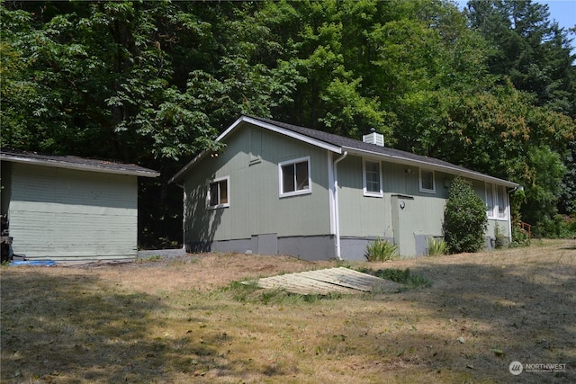 view of property exterior featuring a yard