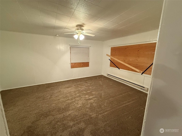 empty room with dark carpet, a baseboard radiator, and ceiling fan