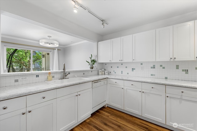 kitchen featuring white cabinets, decorative backsplash, sink, dishwasher, and dark hardwood / wood-style floors