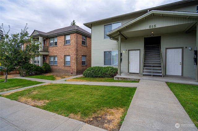 exterior space with a front lawn