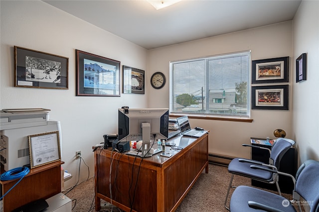 carpeted office featuring a baseboard heating unit