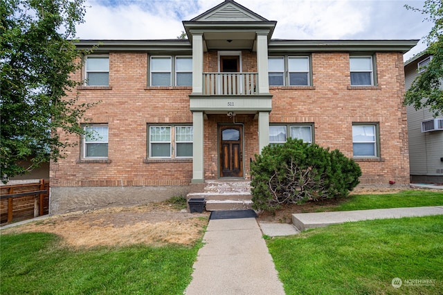 view of front facade with a front lawn