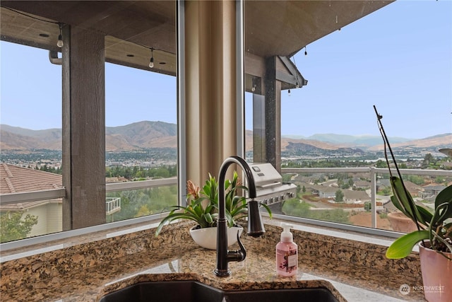 interior details with a mountain view and sink