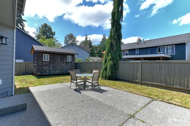 view of patio with a shed