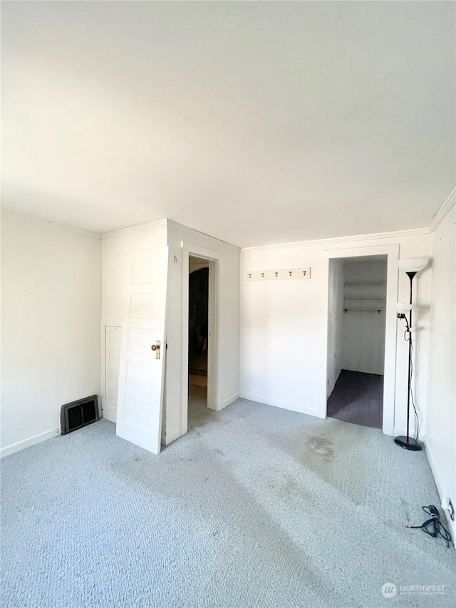 unfurnished bedroom featuring carpet floors