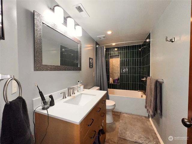 full bathroom with vanity, toilet, and shower / bath combo with shower curtain