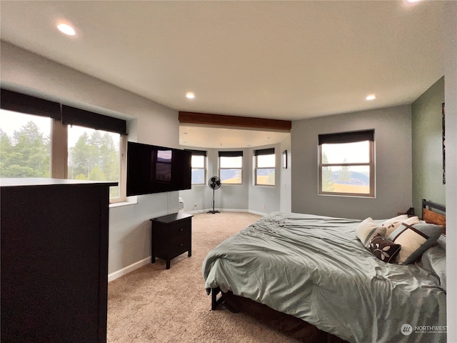 bedroom featuring light colored carpet