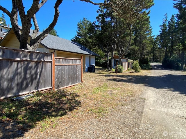 exterior space with a storage shed