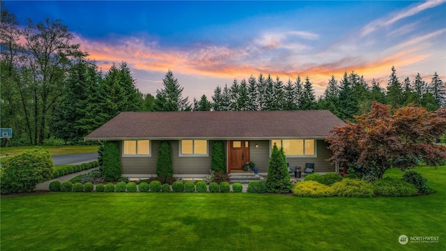 view of front of home with a front yard