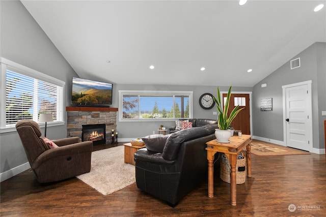 living room featuring recessed lighting, visible vents, a stone fireplace, wood finished floors, and baseboards