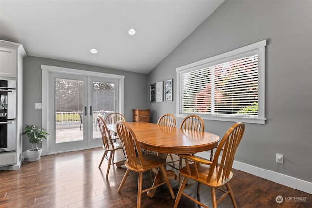 dining area with dark wood-style floors, french doors, recessed lighting, vaulted ceiling, and baseboards