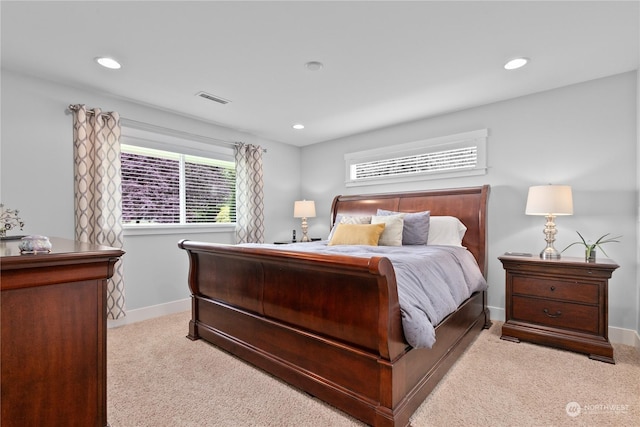 carpeted bedroom with baseboards, visible vents, and recessed lighting