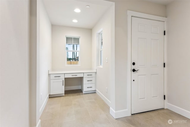 interior space featuring light tile patterned floors