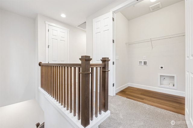 clothes washing area with hookup for a washing machine, electric dryer hookup, and carpet floors