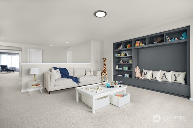 carpeted living room featuring built in shelves