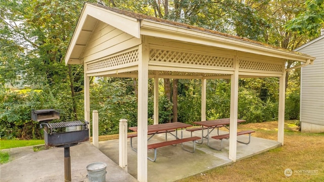 view of home's community with a gazebo and a patio area