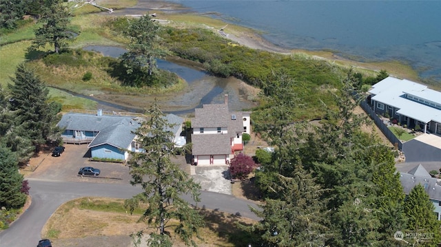 birds eye view of property featuring a water view