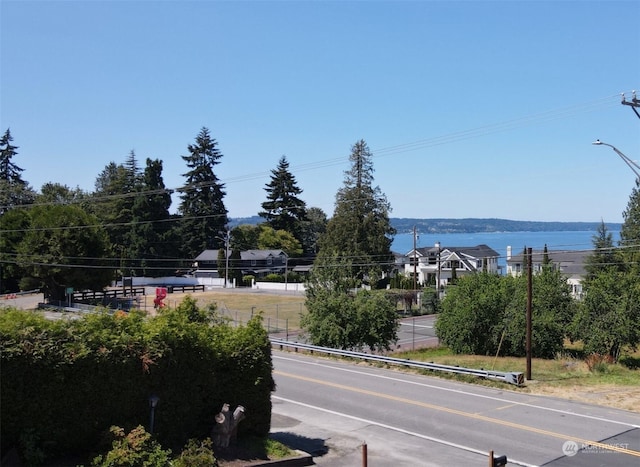 view of road with a water view