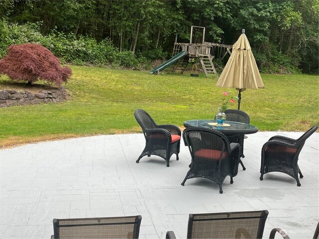 view of patio with a playground