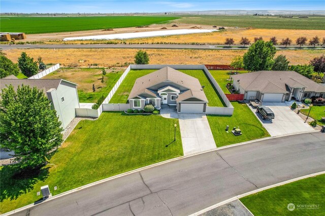 birds eye view of property featuring a rural view