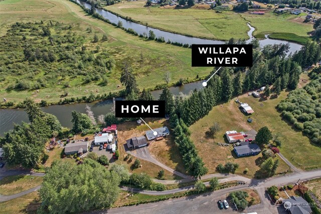 bird's eye view featuring a water view and a rural view