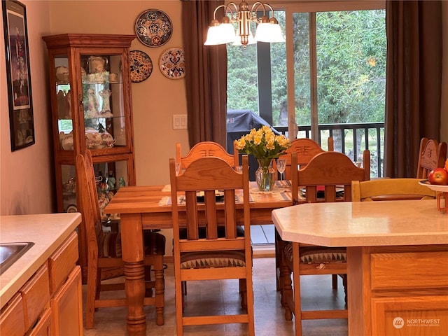 dining room featuring a notable chandelier