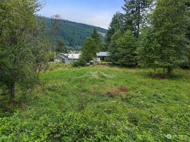 exterior space featuring a mountain view