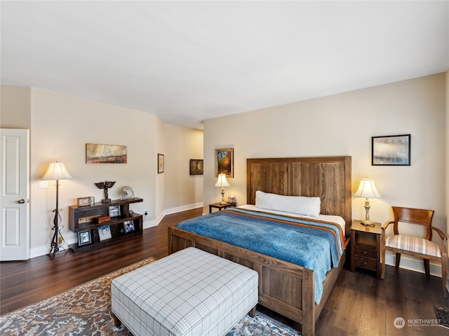 bedroom featuring dark wood-type flooring