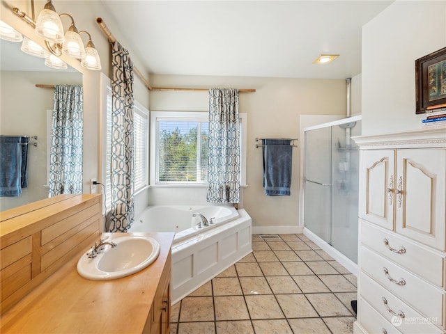 bathroom with vanity, tile patterned floors, and separate shower and tub