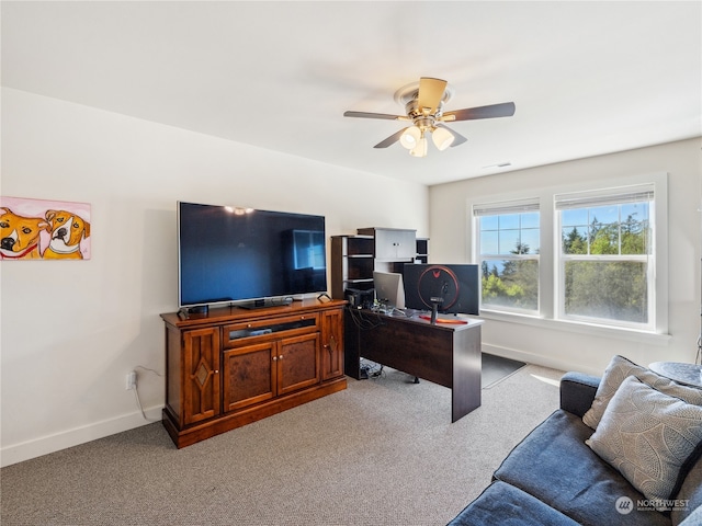 office with light colored carpet and ceiling fan