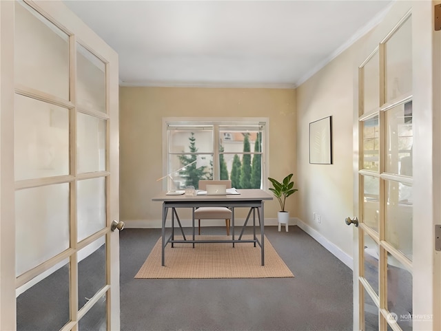 office area featuring french doors, ornamental molding, and dark colored carpet